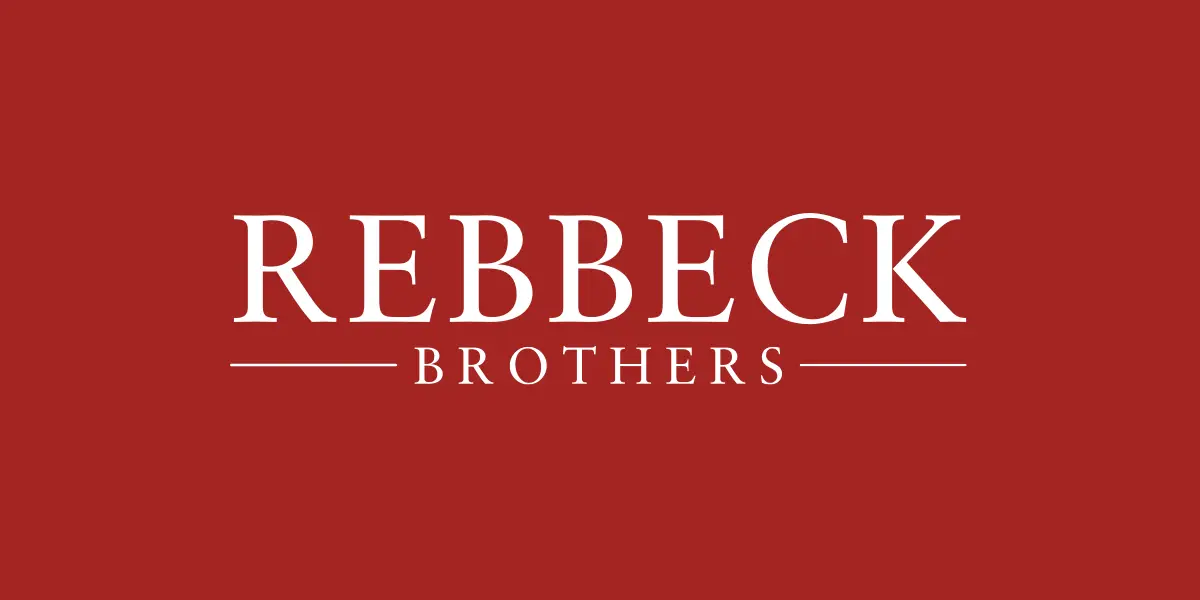 Rebbeck Borthers Brand Logo 2019 on red background